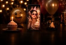Funny birthday Instagram selfie with cupcake and party props in a dark setting